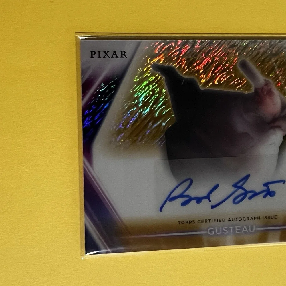 2026 Topps Disney Neon‎ Etch Auto Gold Shimmer #CNABG Brad Garrett Gusteau /50
